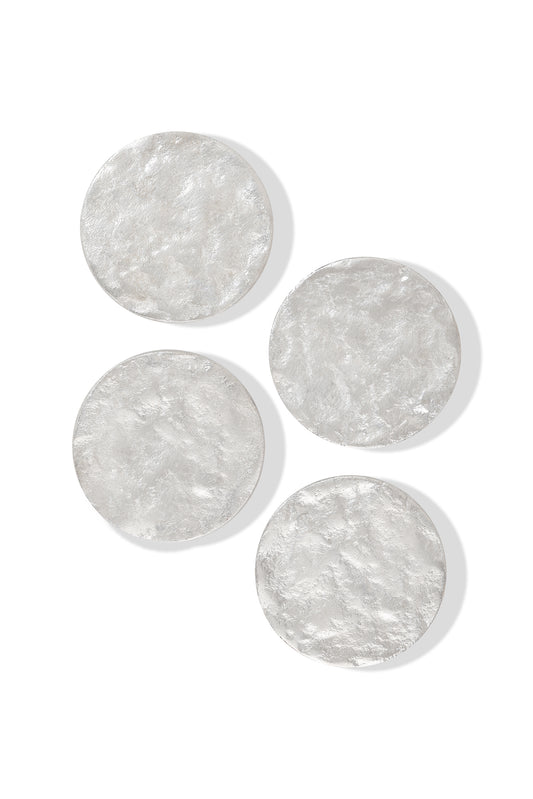 Four round, textured clear acrylic coasters arranged on a white background.